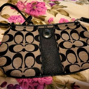 Black logo Coach wristlet